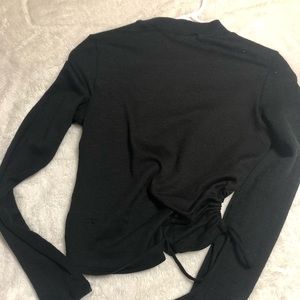 Black long sleeve high neck top with pull string side detail- worn once